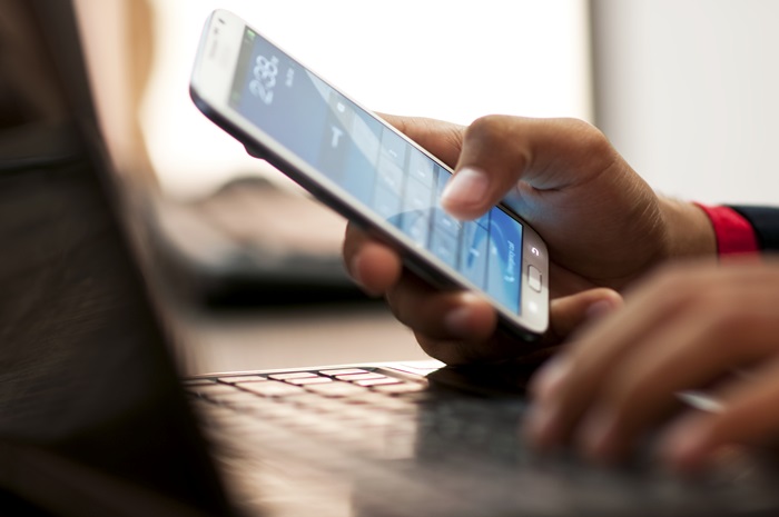 Businessman using smart phone